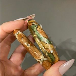Two beautiful metal bangle bracelets